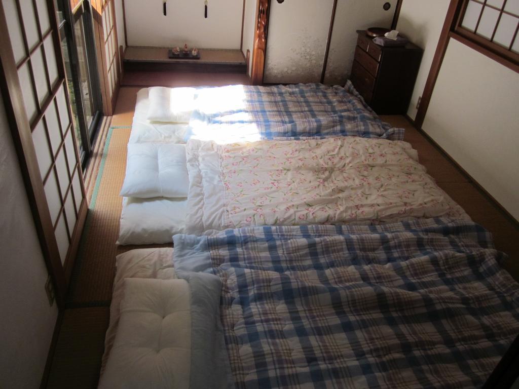 Enman Guest House Osaka Moriguchi Exterior foto
