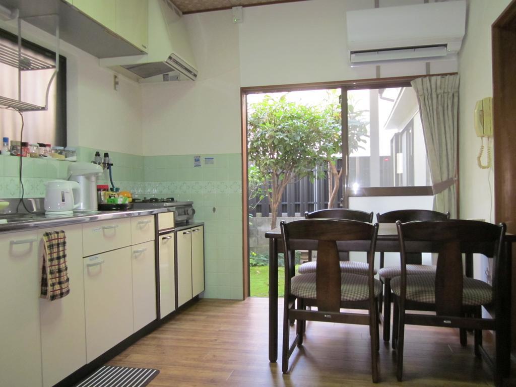 Enman Guest House Osaka Moriguchi Exterior foto