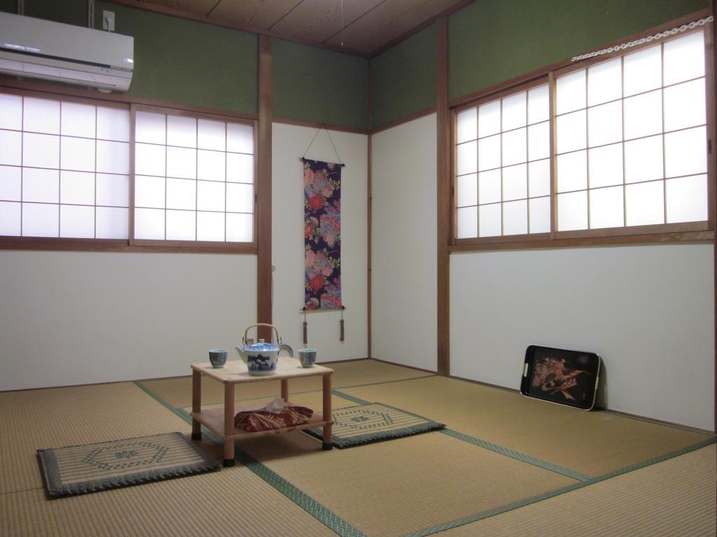 Enman Guest House Osaka Moriguchi Exterior foto